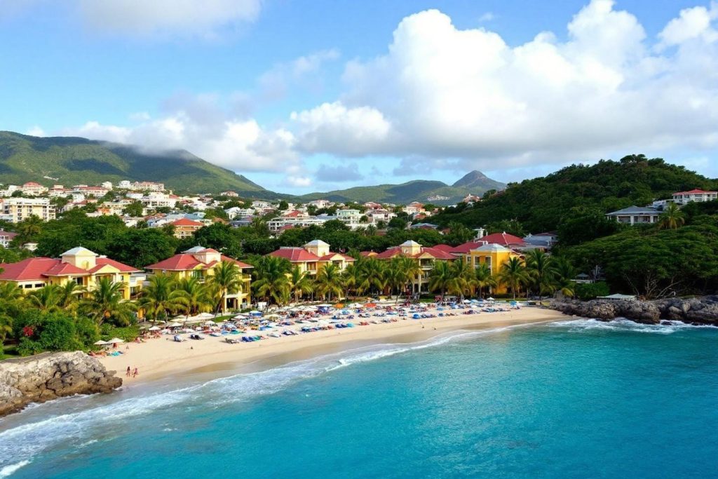 Littoral avec sable blanc, mer turquoise et villas colorées